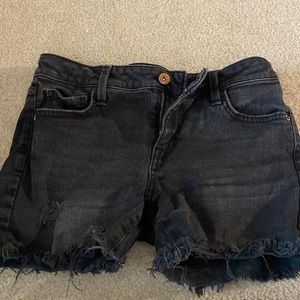 Black jean shorts sized 3! Cute ruffles and fluff at the bottom!